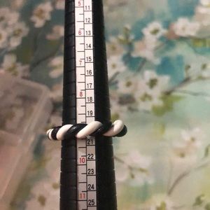 Black and white clay ring